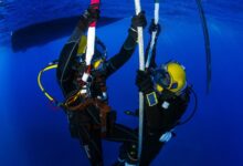 A diver inspecting underwater structures